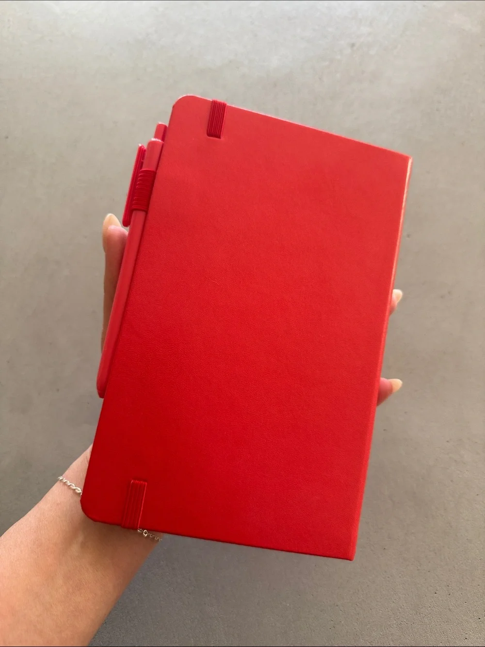 NWOT FEELA CORAL/RED HARDBACK NOTEBOOK WITH PEN